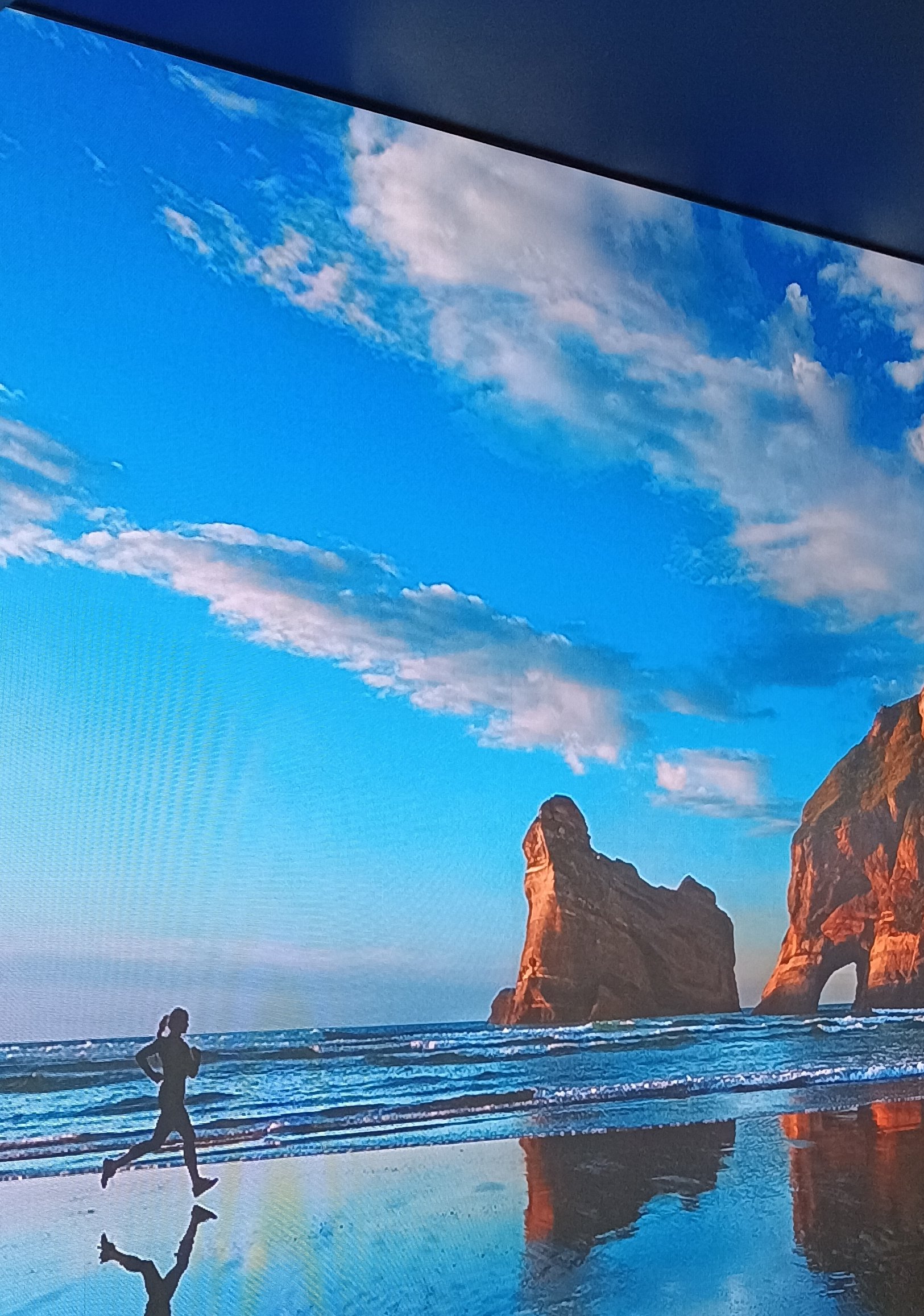 Painel de LED P2.5 exibindo paisagem de praia em alta definição na loja da Yamaha